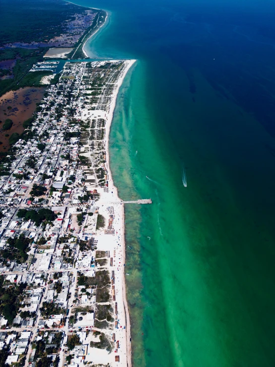 a beach that is next to some water