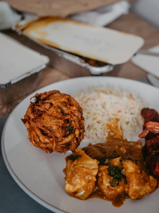 a white plate of food that includes a variety of foods