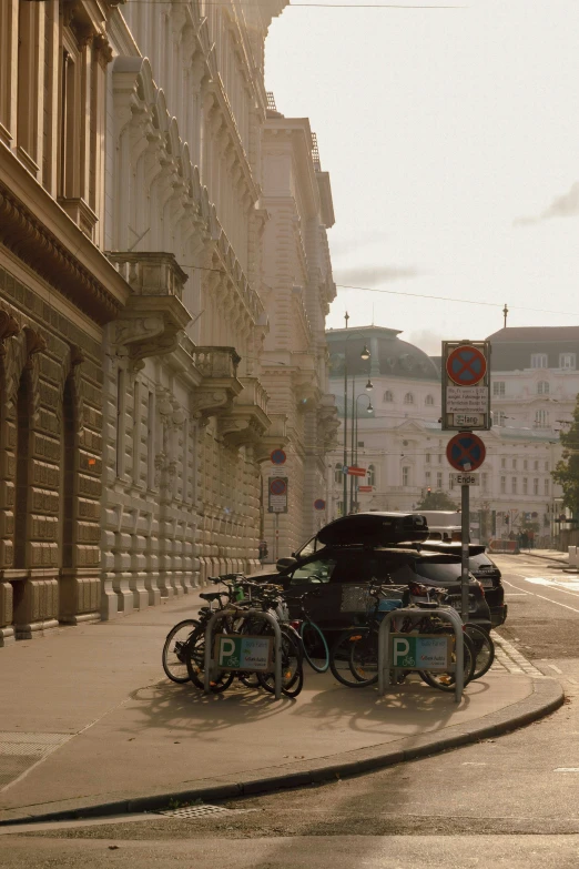 a car parked next to a building on the street