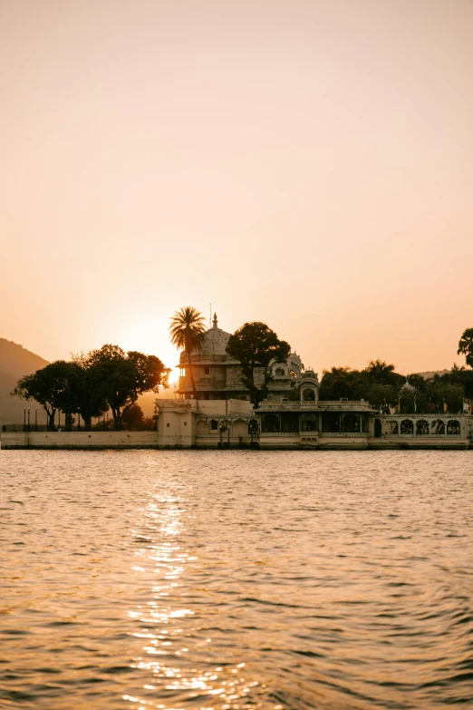 a view of an area near the water at sunset