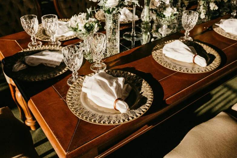 an elegant set table with place settings