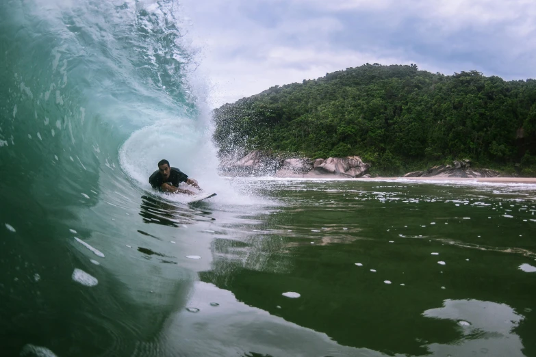 a surfer rides the crest of a wave