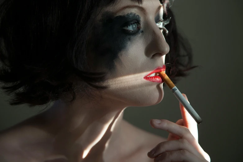 an image of a beautiful woman smoking a cigarette