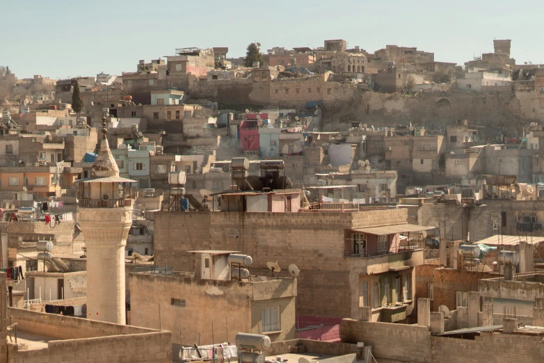 a very large hill filled with city homes