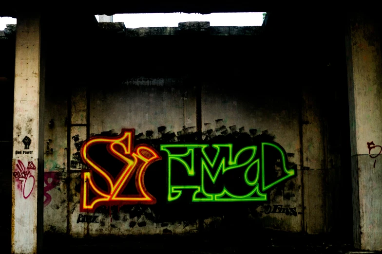 neon signs that are on the side of an old building