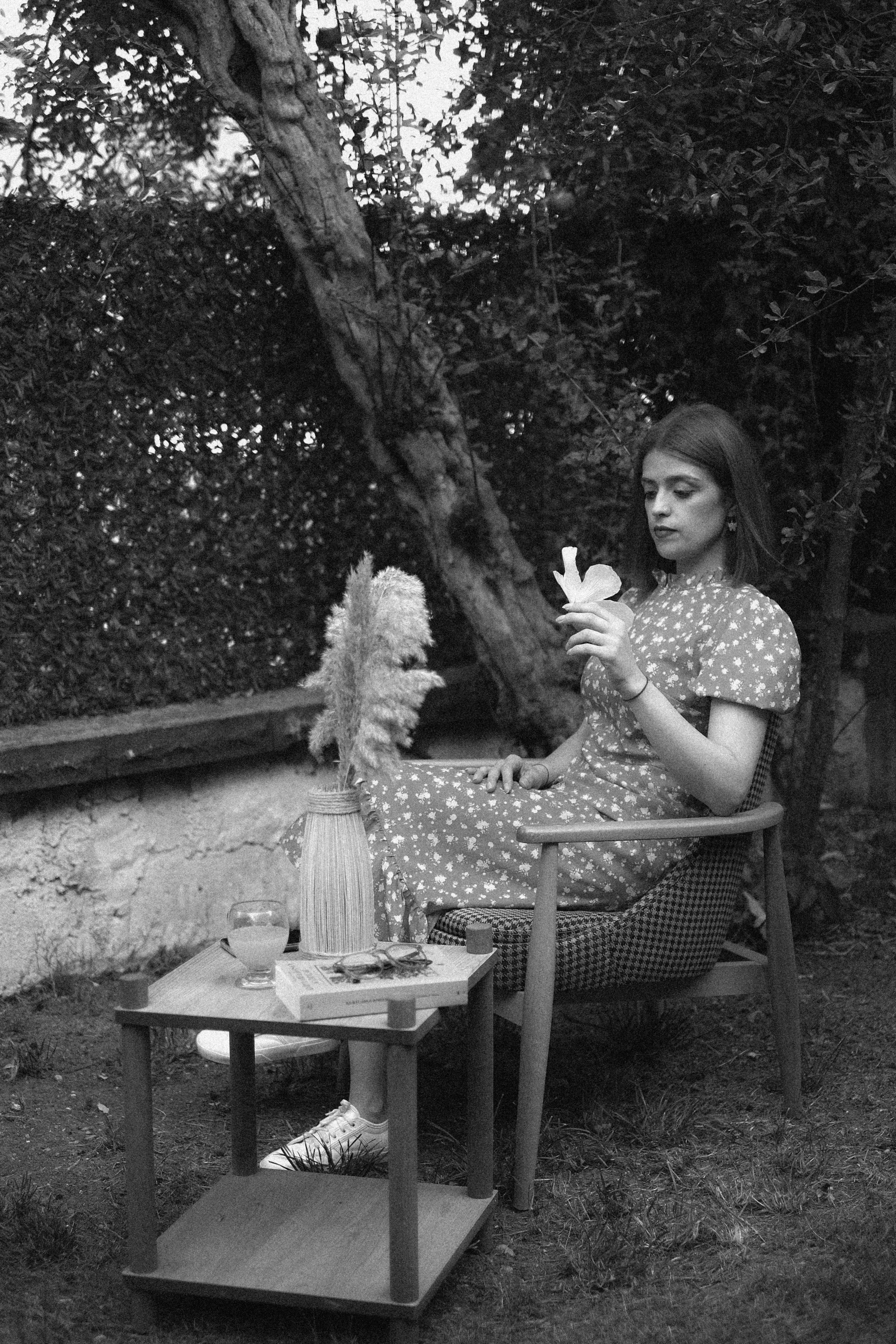 a woman sitting at a table eating food