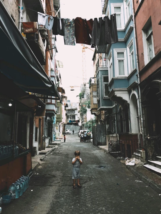 a  walking on an empty city street