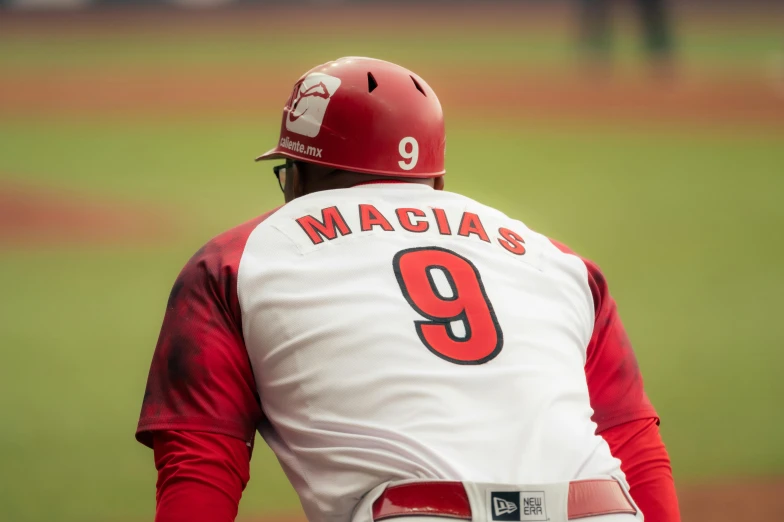 a baseball player with a helmet on in position