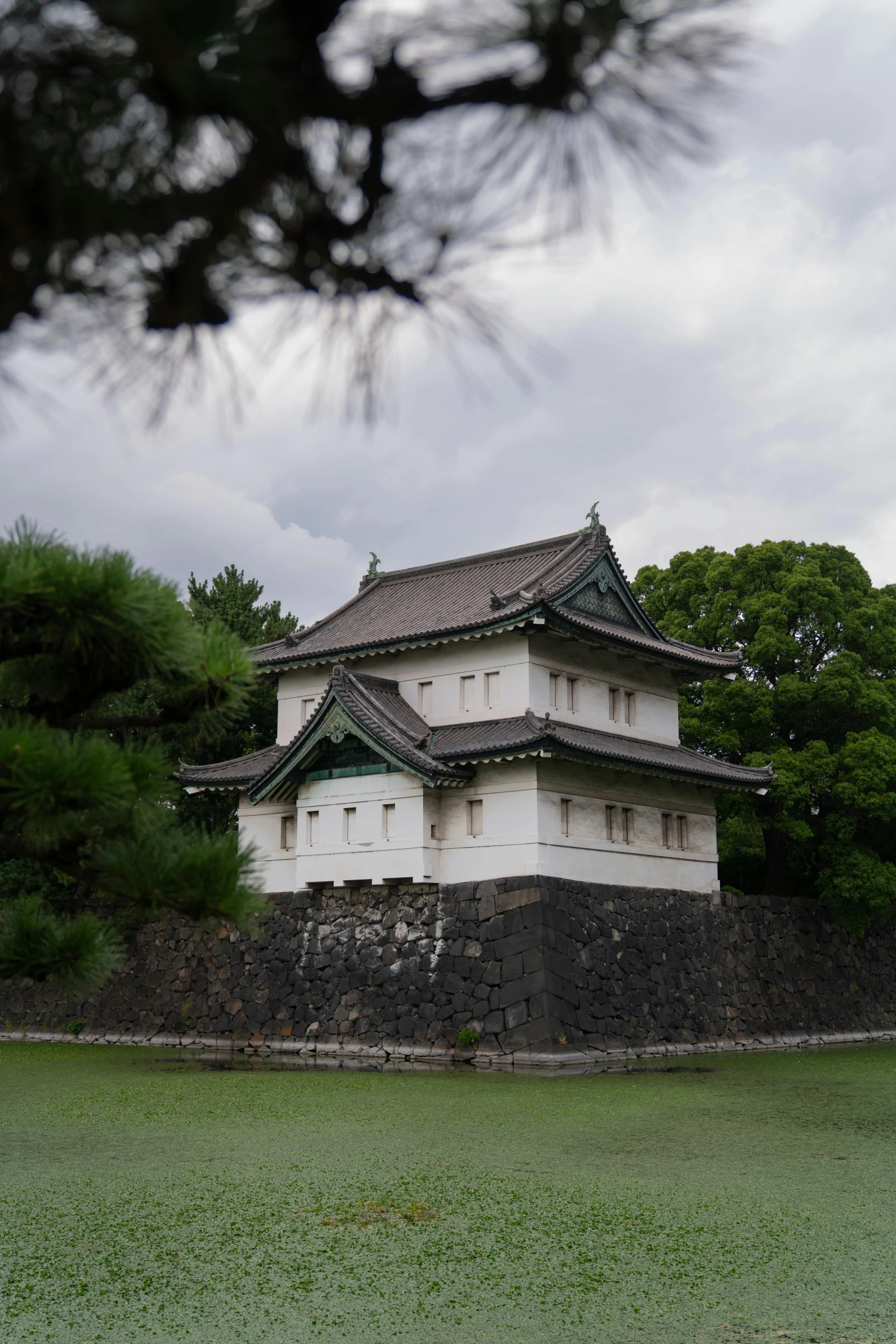 the large white building has an arched roof