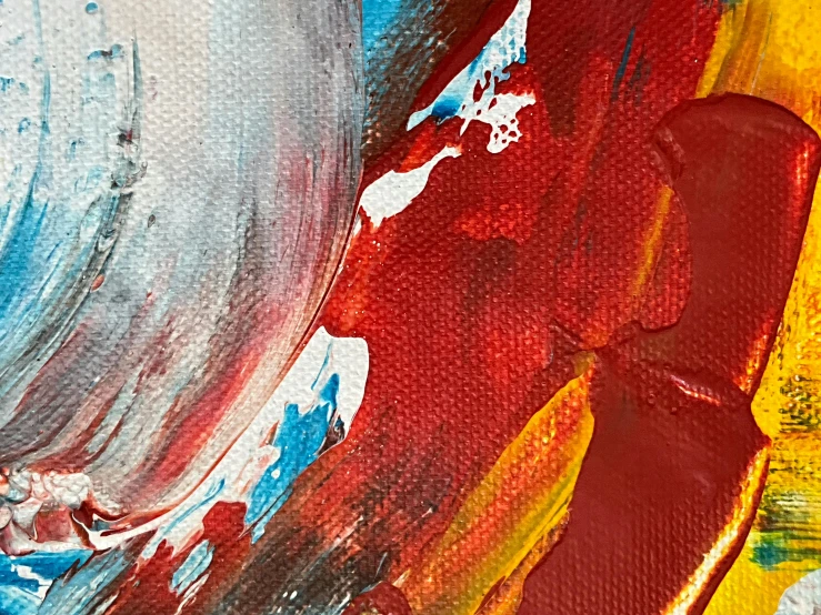 a close up of paint on canvas with color