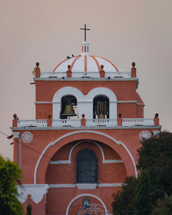 an old bell tower with a big dome