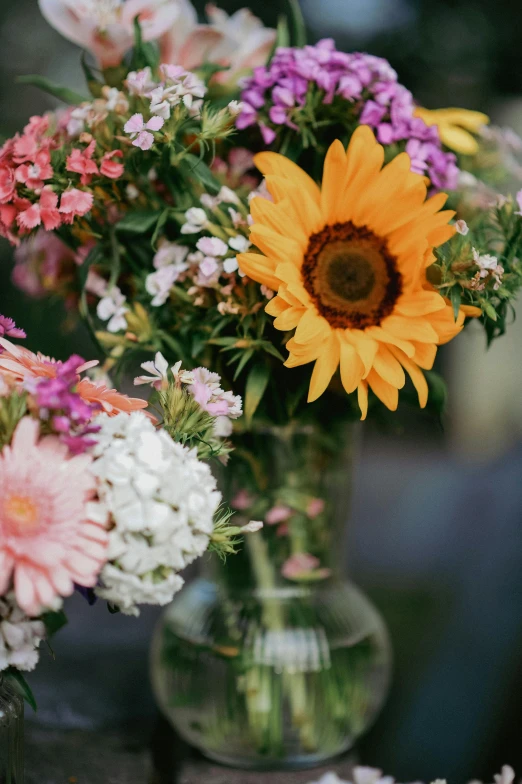 a small vase with some flowers inside of it