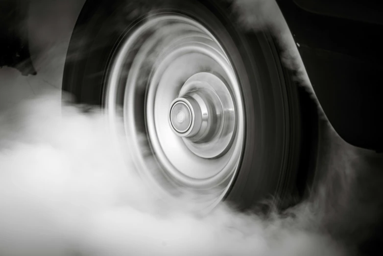 black and white image of the front end of a car