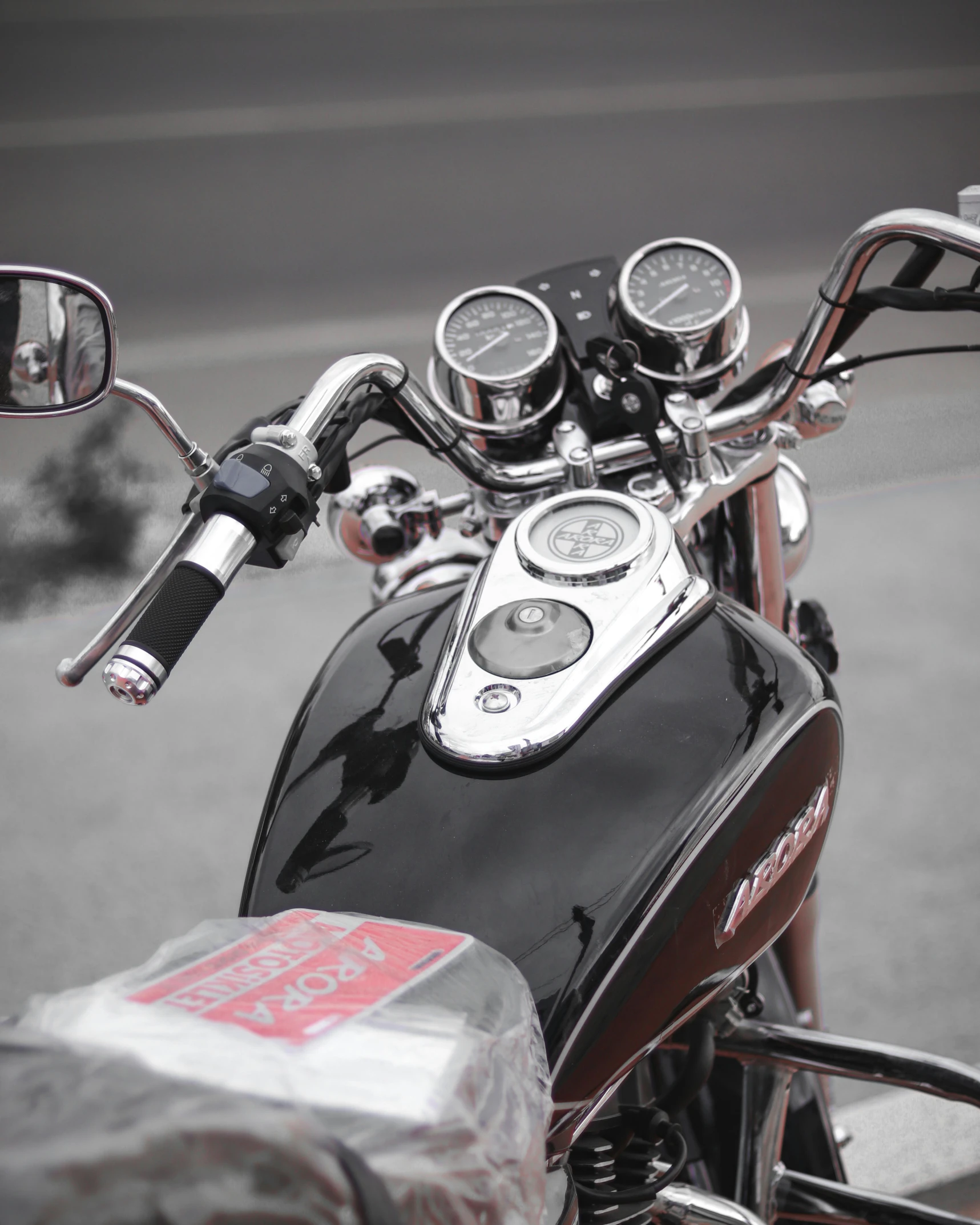 a motorcycle that has a bunch of gauges on the handle bars