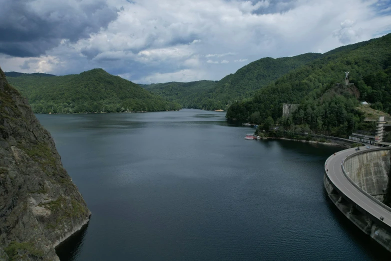 the water at the side of a large dam wall