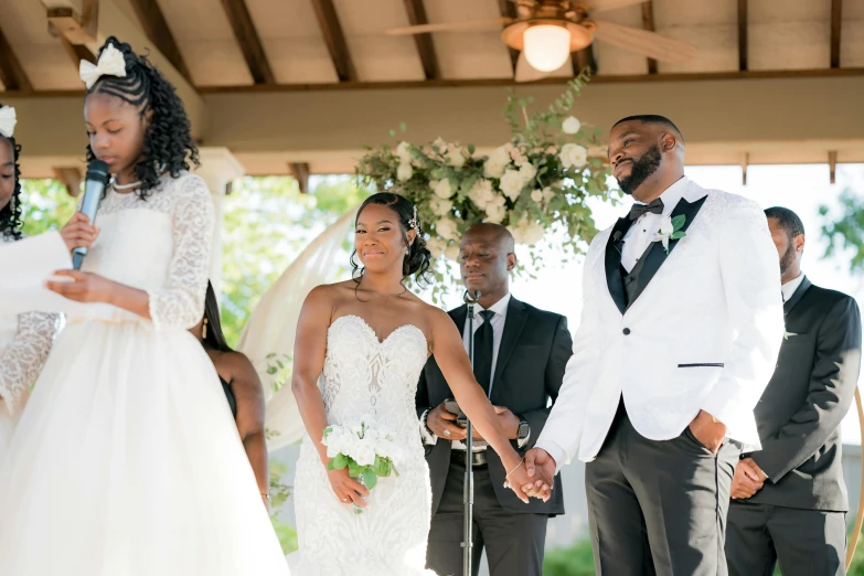 a couple standing at the alter with each other