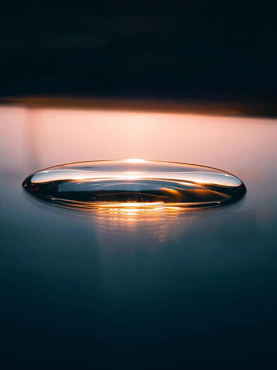 a water reflection is on the surface of the floor