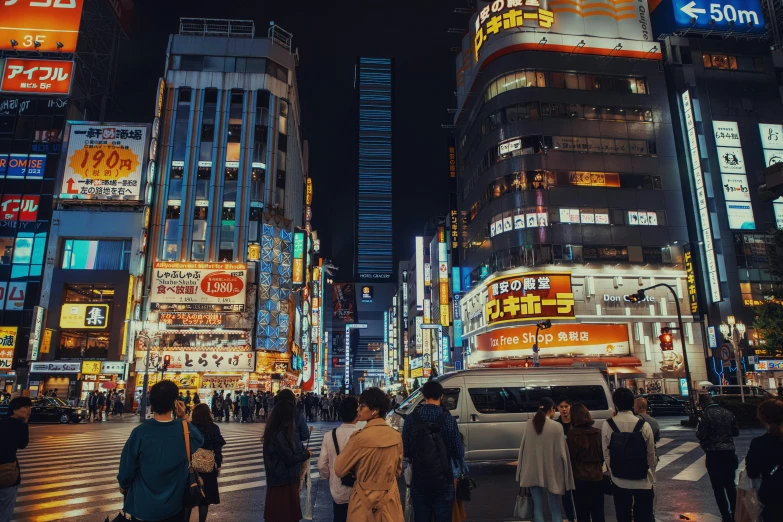 a group of people walk down the street in the city