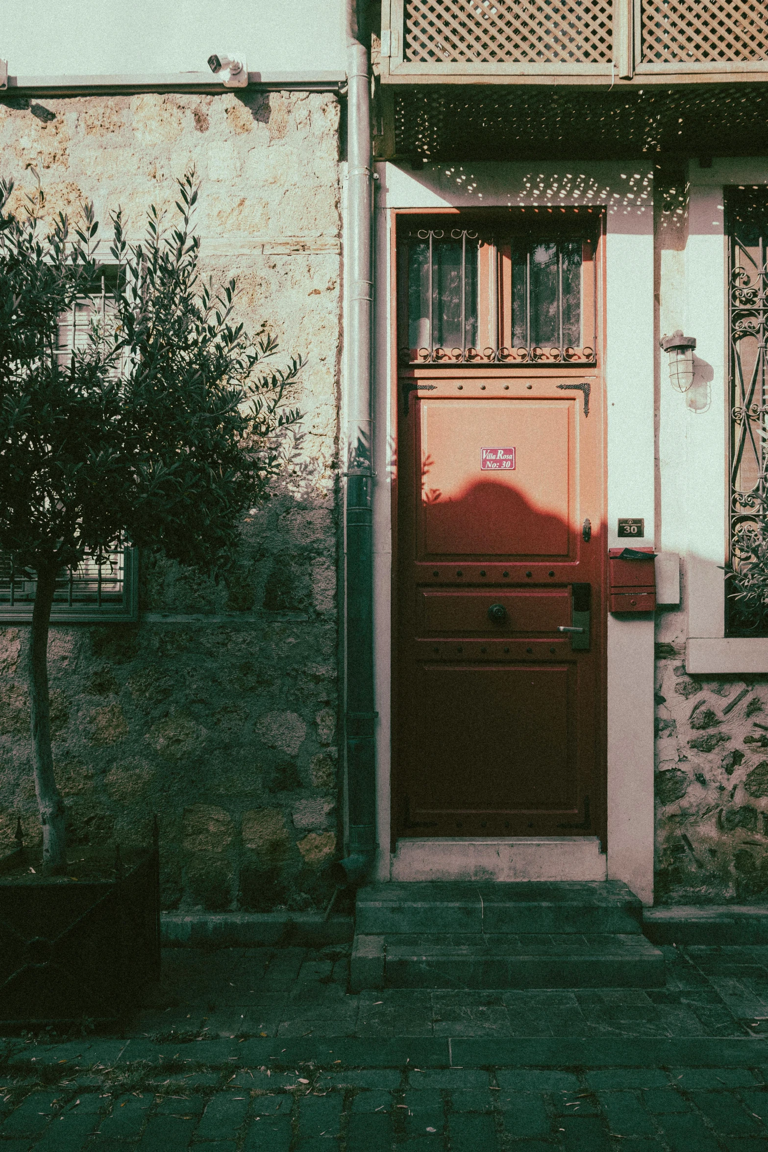 a doorway on a house on an empty street