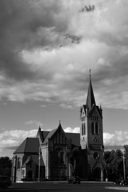 a church with a tall steeple next to it