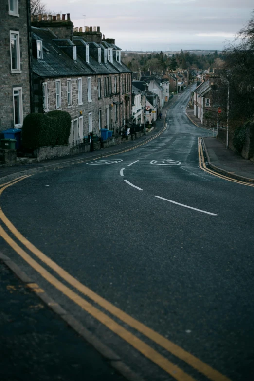 a road is shown with a curve in the street