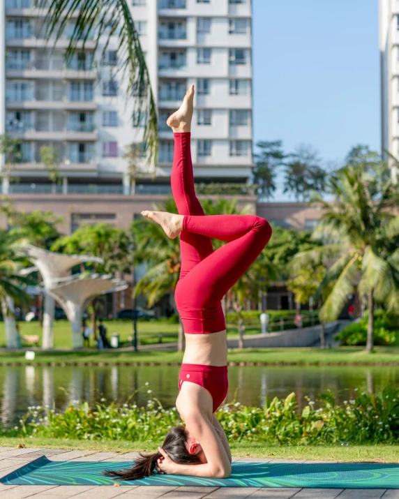 the woman is doing yoga on her back