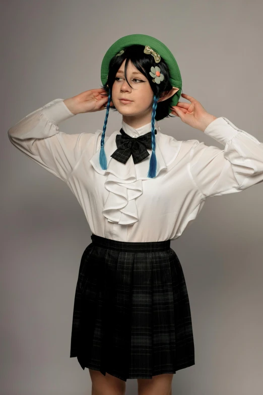 woman in short skirt wearing a hat and blouse