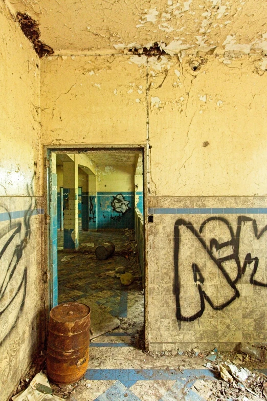 a picture of a room with graffiti and graffiti writing on the walls