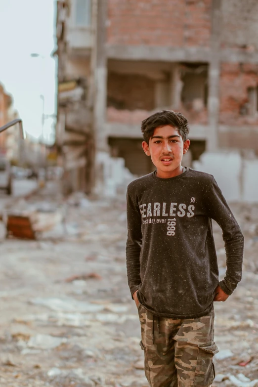 a  stands outside in front of a building