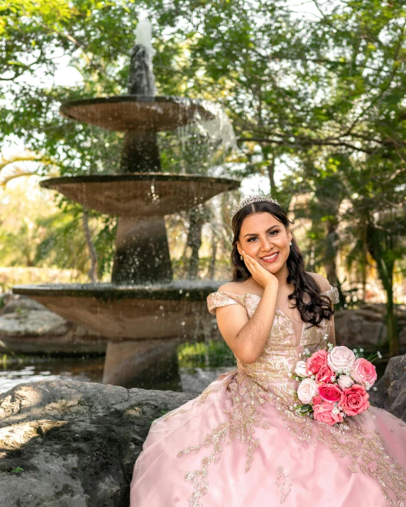 a girl in a dress is posing for the camera