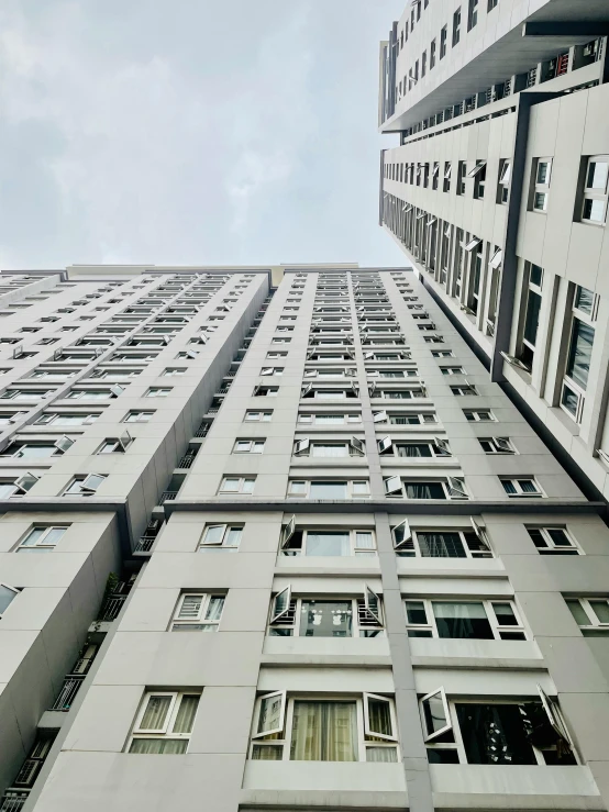 looking up at a multi - story building from below