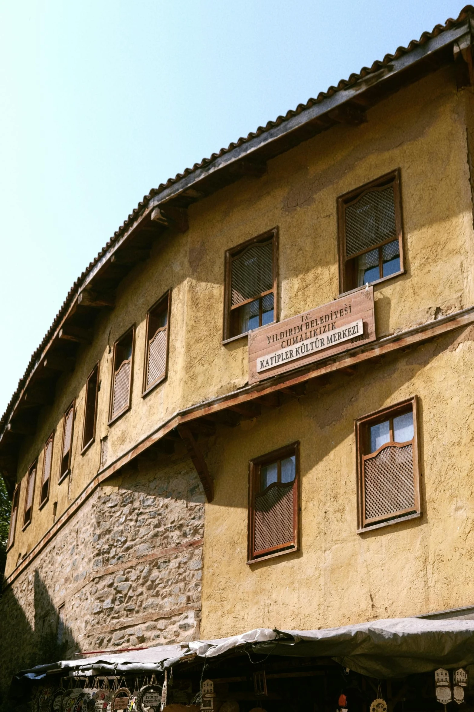 a building with three stories next to each other