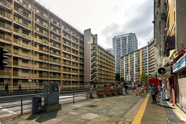 a city street surrounded by high rise buildings