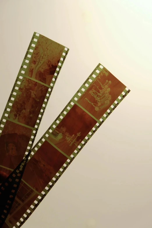 two film strip films attached to an electronic device