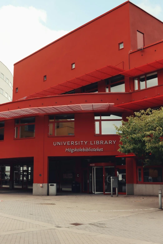 the university liry is a red building with large windows