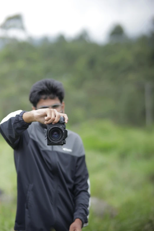 a man taking a picture with his camera