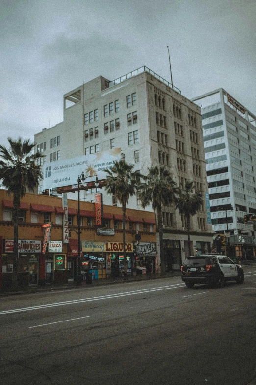 a street with a bunch of tall buildings near by