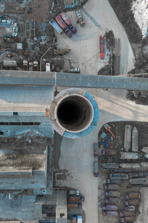 a large cement pipes is seen from above