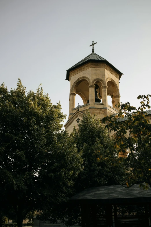 a view from the ground of a tall tower