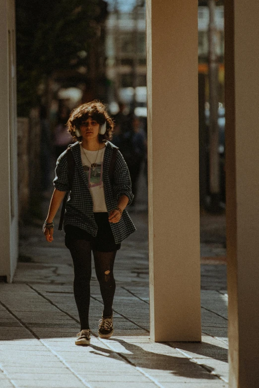 an image of a woman walking in the street