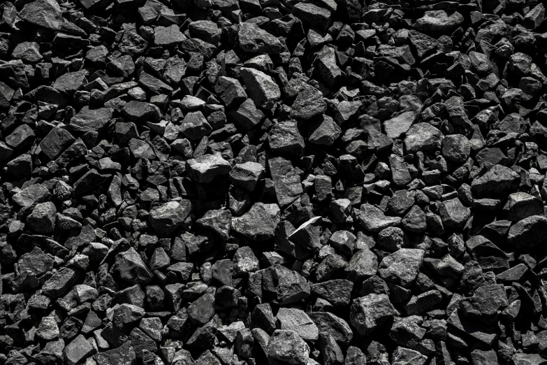 dark gray rocks against white background