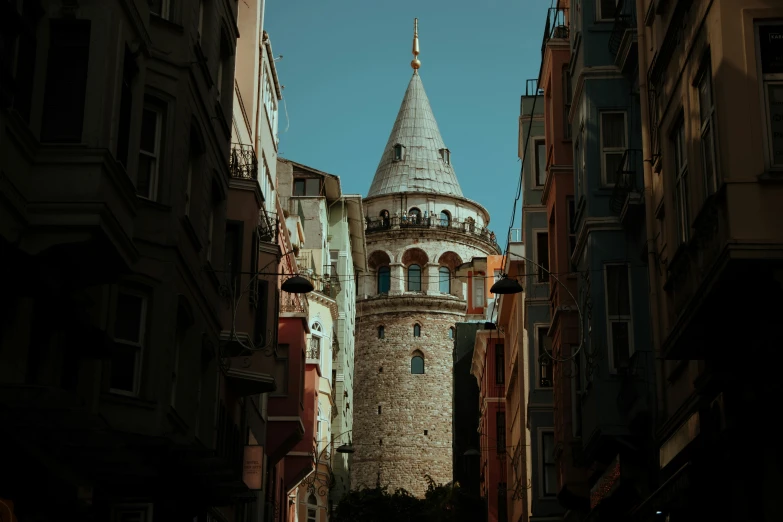 a tower that is next to a street