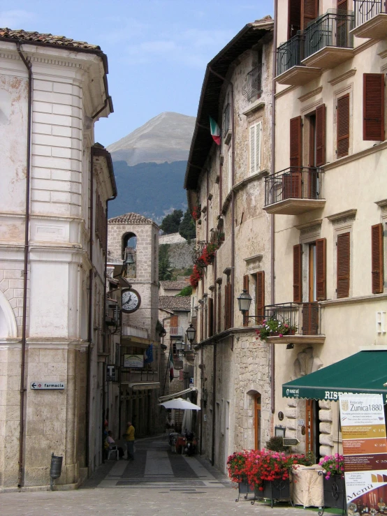 there are many buildings in the city with lots of balconies