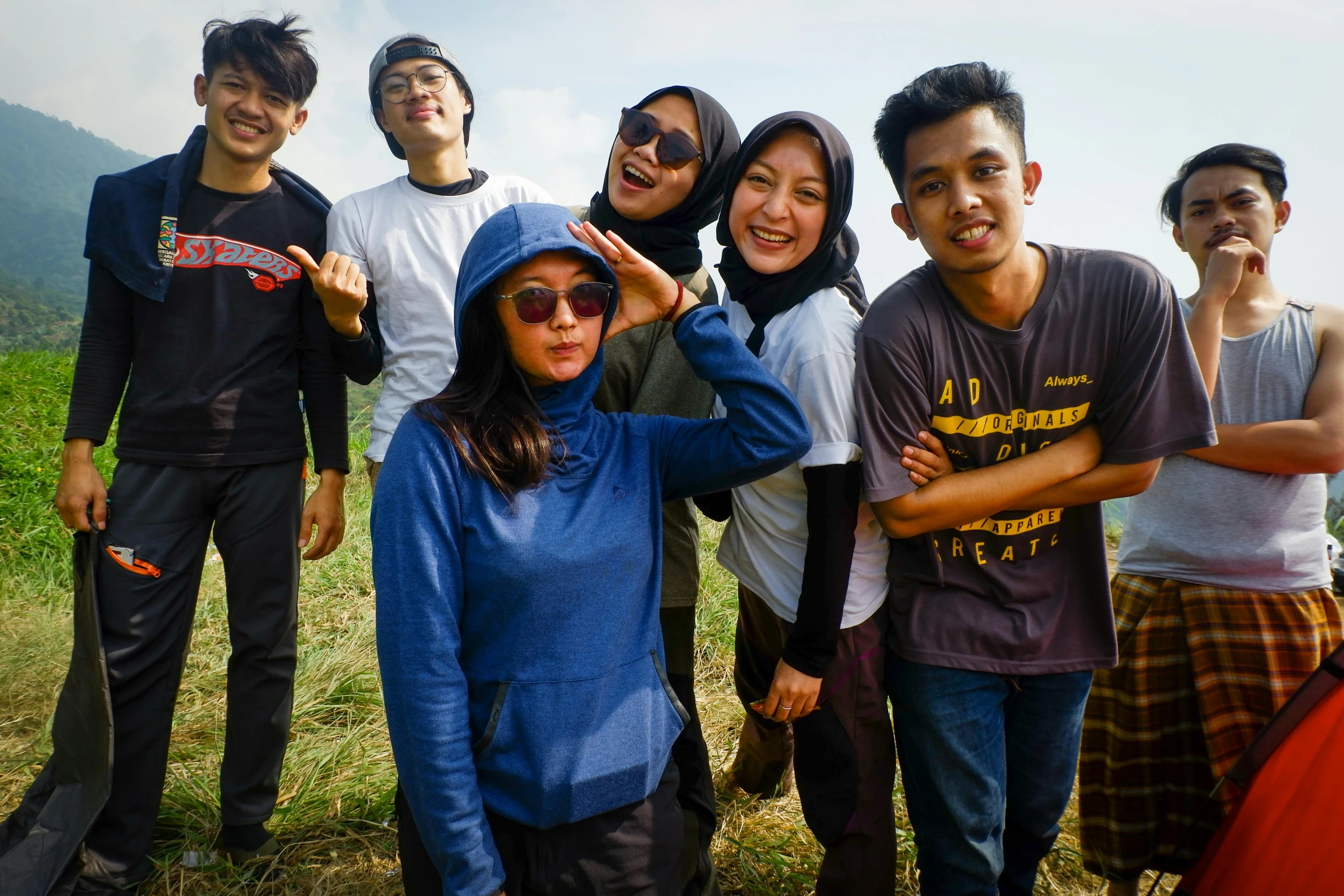 a group of friends pose for the camera