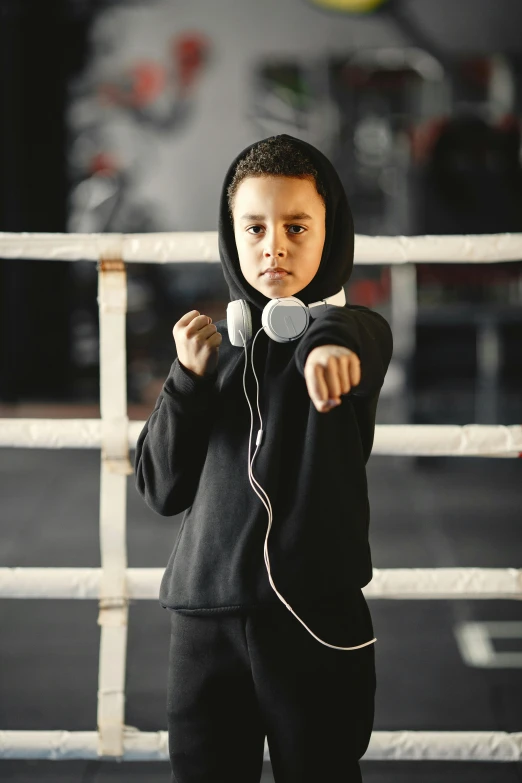 a child wearing headphones and listening to music