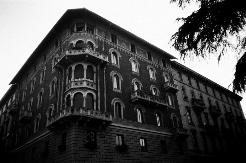 a building with a clock on the top and second story