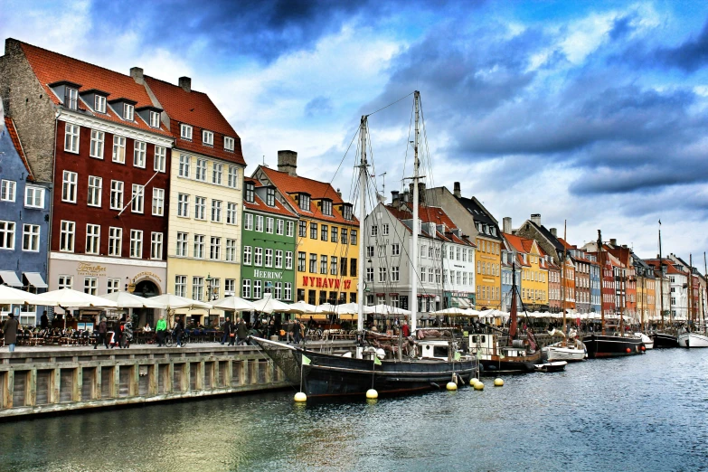 a waterway with several boats docked along it