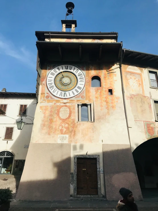 an old tower with a clock on the front