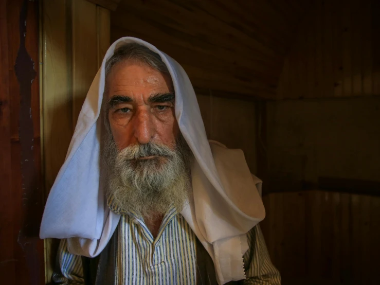 man wearing a veil with beard and eyes