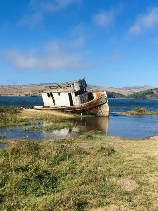 a boat is sitting in a body of water